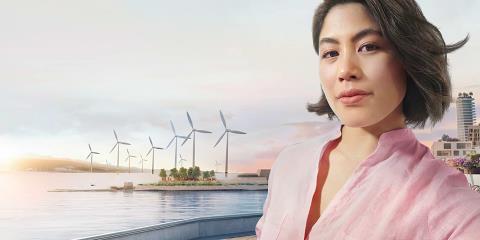 Woman infront of wind turbines
