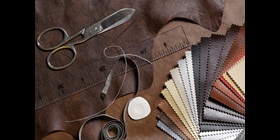 Samples of TPU synthetic leather, fanned out to show a range of colors and textures.