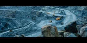 Open mine with excavation and transport vehicles