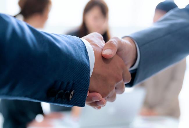 Business people shaking hands